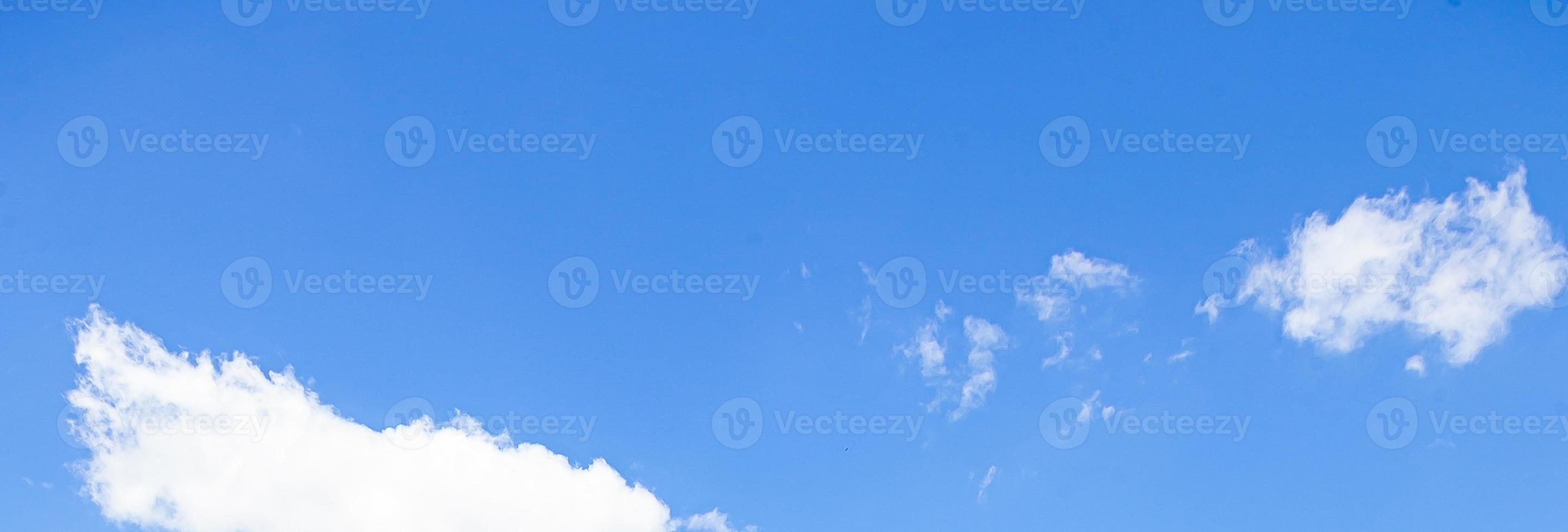 Image of a partly cloudy and partly clear sky during the day photo