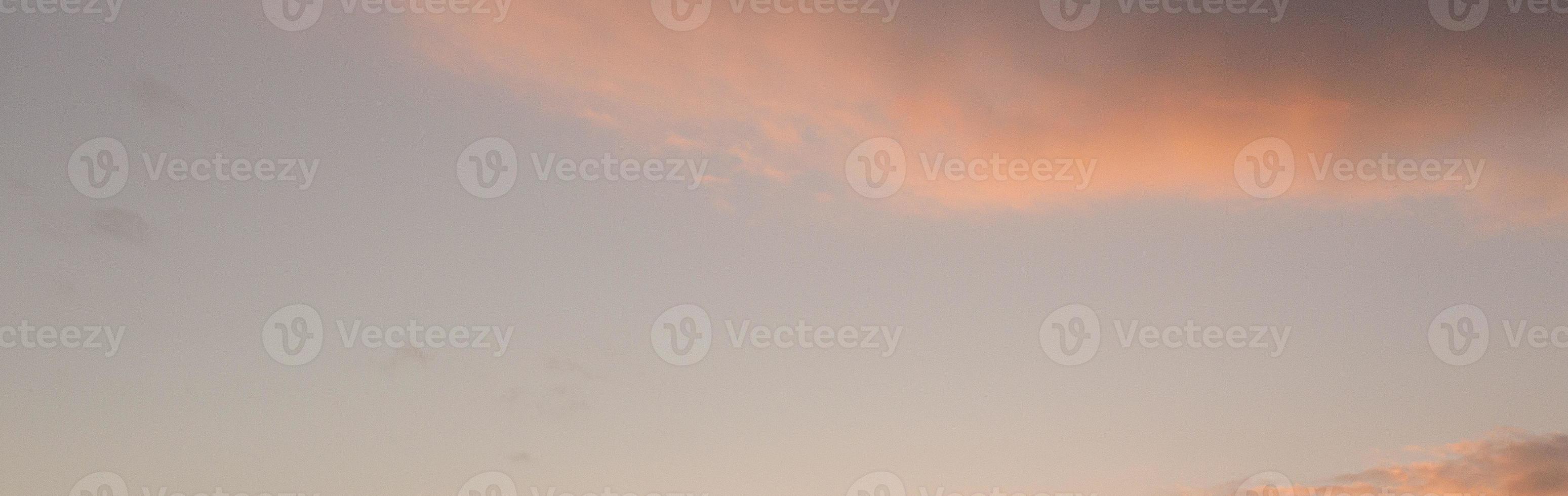 Dramatic colorful sky with afterglow and illuminated clouds photo