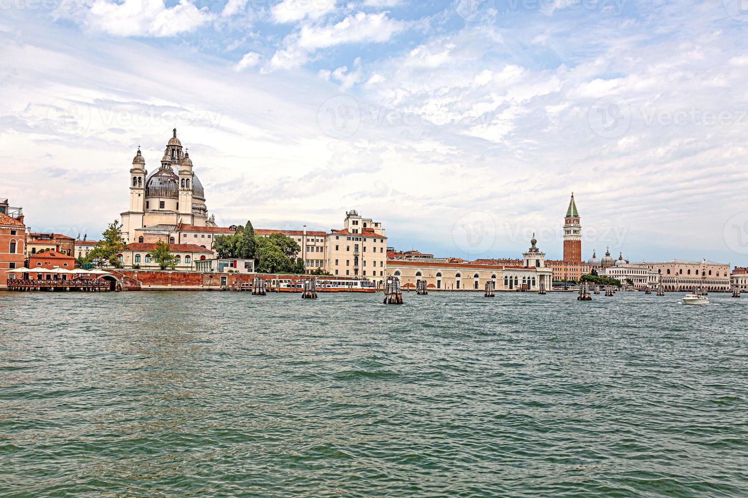 Panoramic view on Venice from lagoon during daytime photo