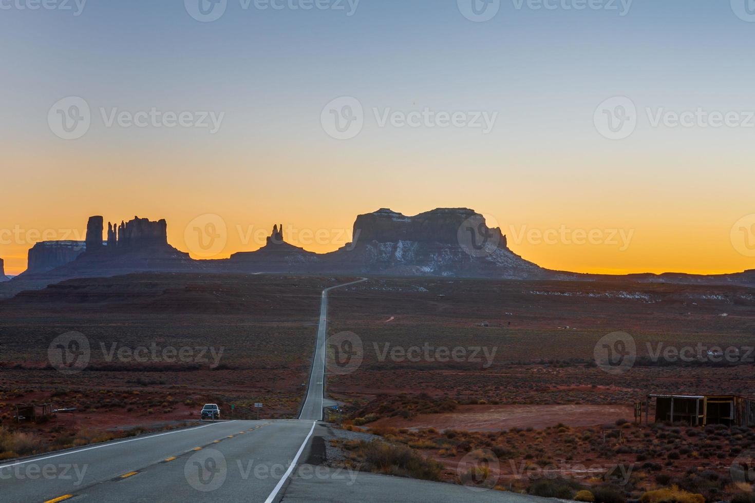 Rock formation of Monument Valley in evening backlight in winter photo