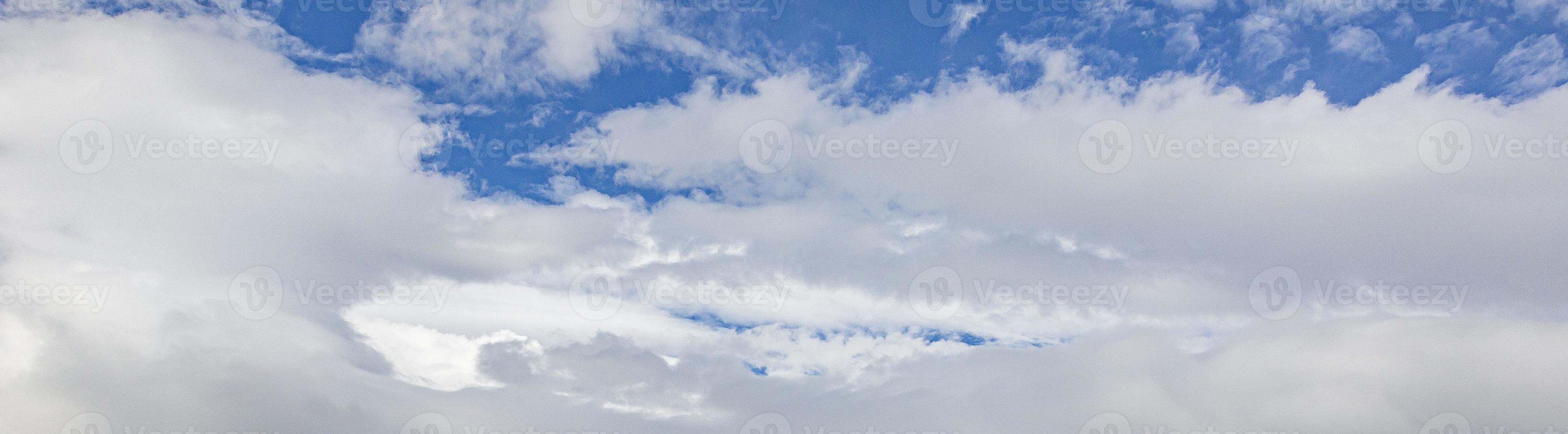 Image of a partly cloudy and partly clear sky during the day photo