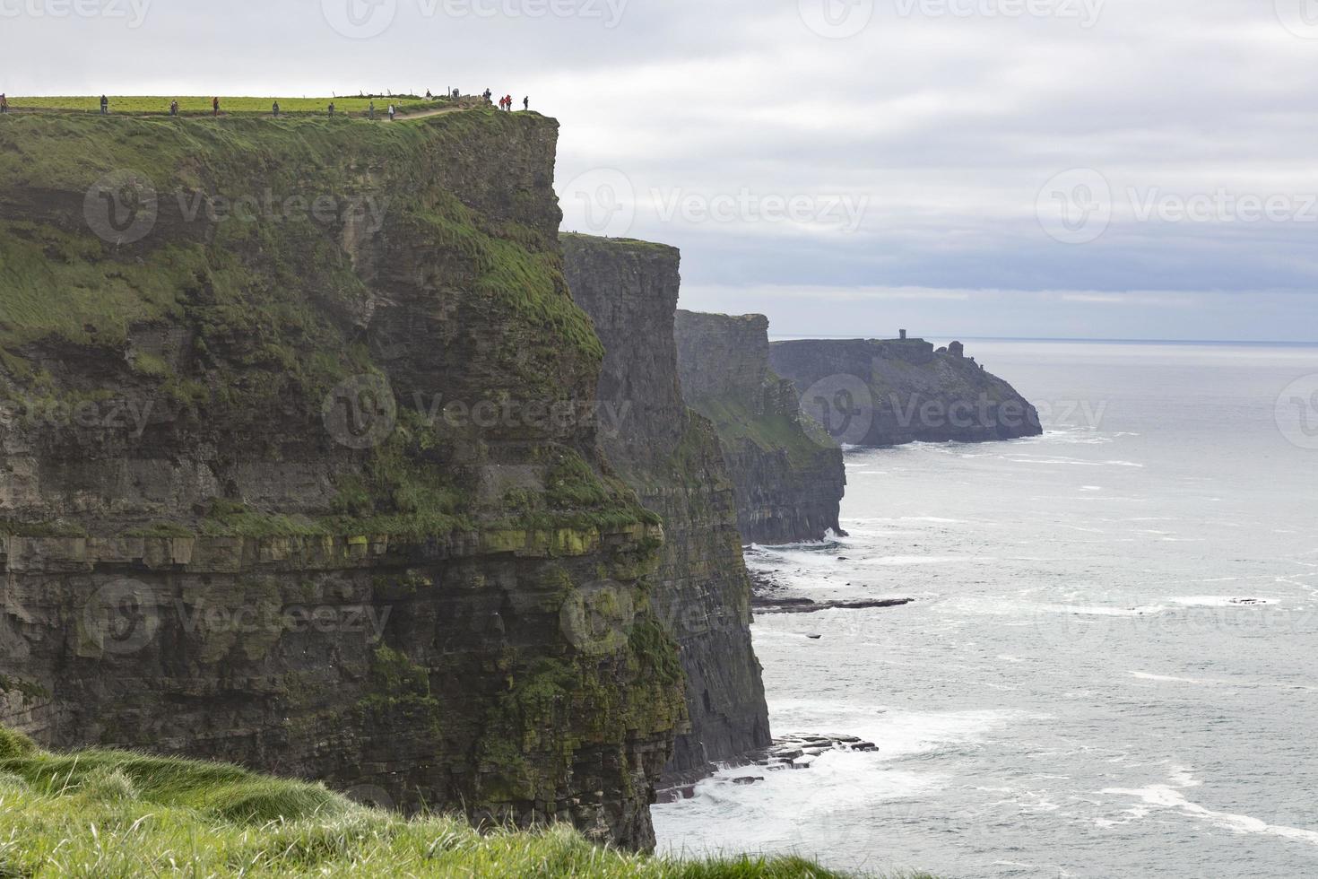 View over cliff line of the Cliffs of Moher in Ireland during daytime photo