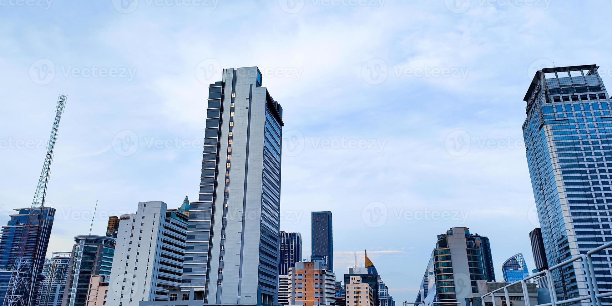 Horizontal banner of large city buildings with sky. photo