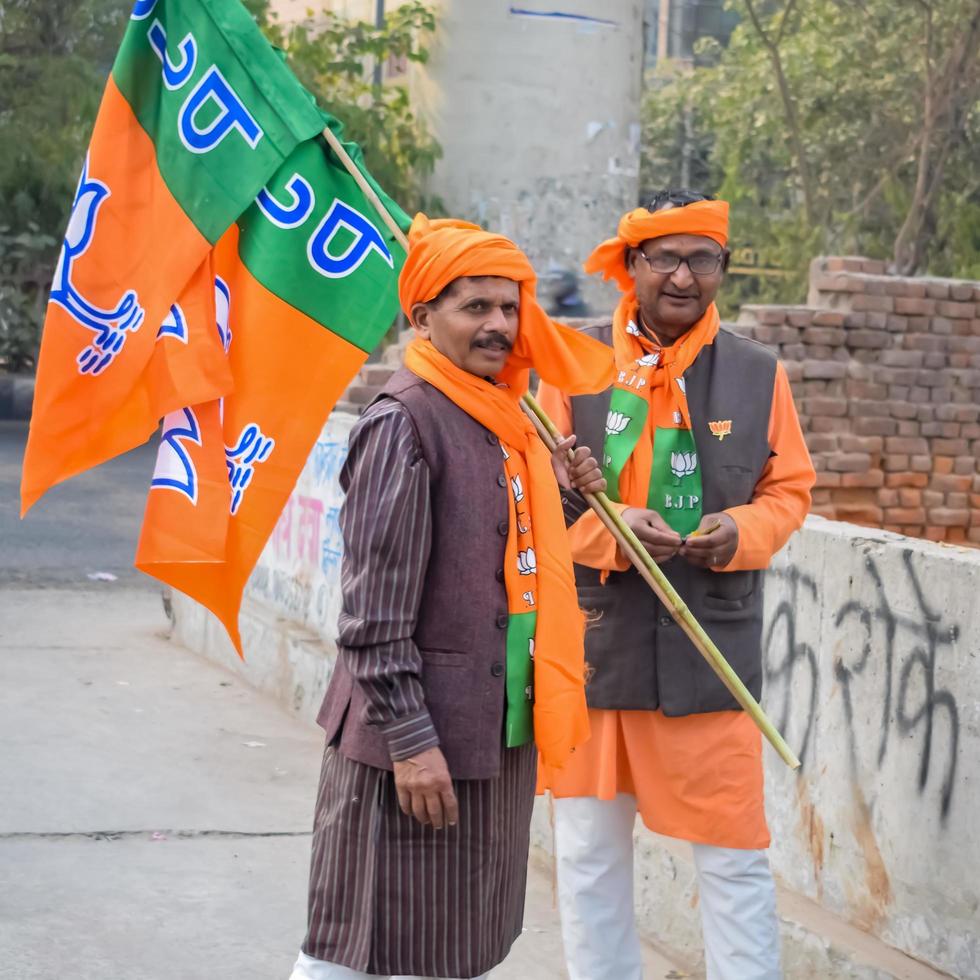 Delhi, India, December 02 2022 -Bharatiya Janata Party BJP supporter during mega road show in support of BJP candidate Pankaj Luthara to file nomination papers ahead of MCD local body Elections 2022 photo