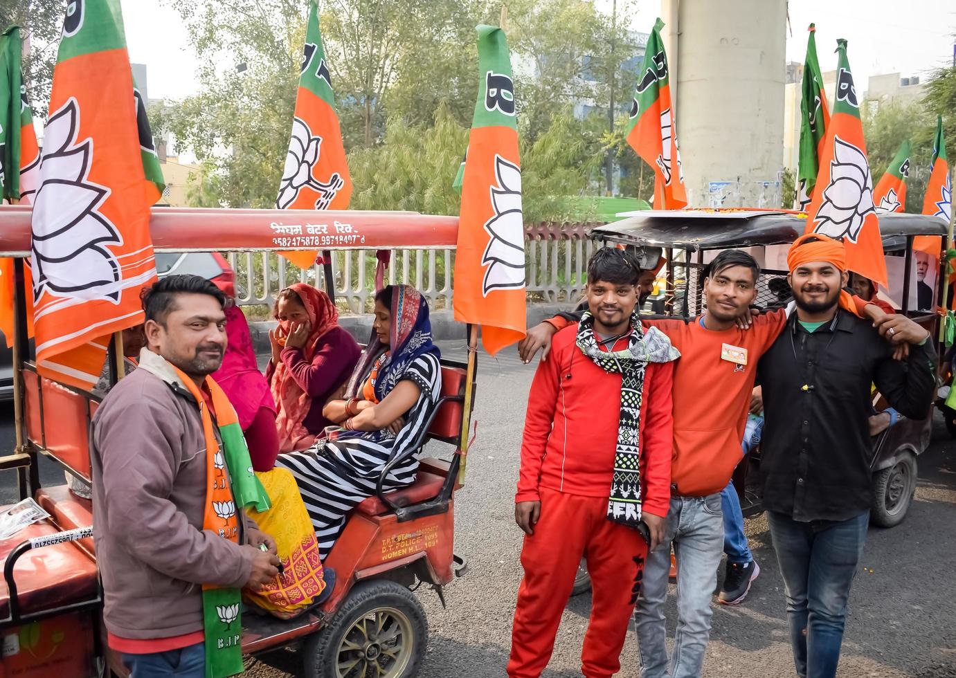 Delhi, India, December 02 2022 -Bharatiya Janata Party BJP supporter during mega road show in support of BJP candidate Pankaj Luthara to file nomination papers ahead of MCD local body Elections 2022 photo