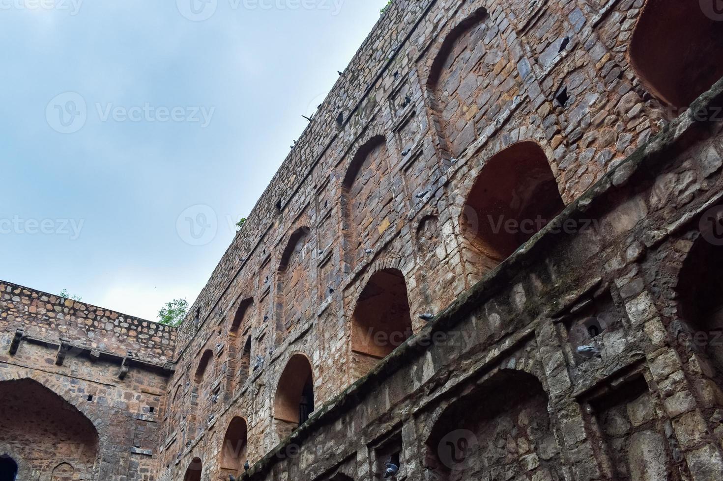 Agrasen Ki Baoli Step Well situated in the middle of Connaught placed New Delhi India, Old Ancient archaeology Construction photo