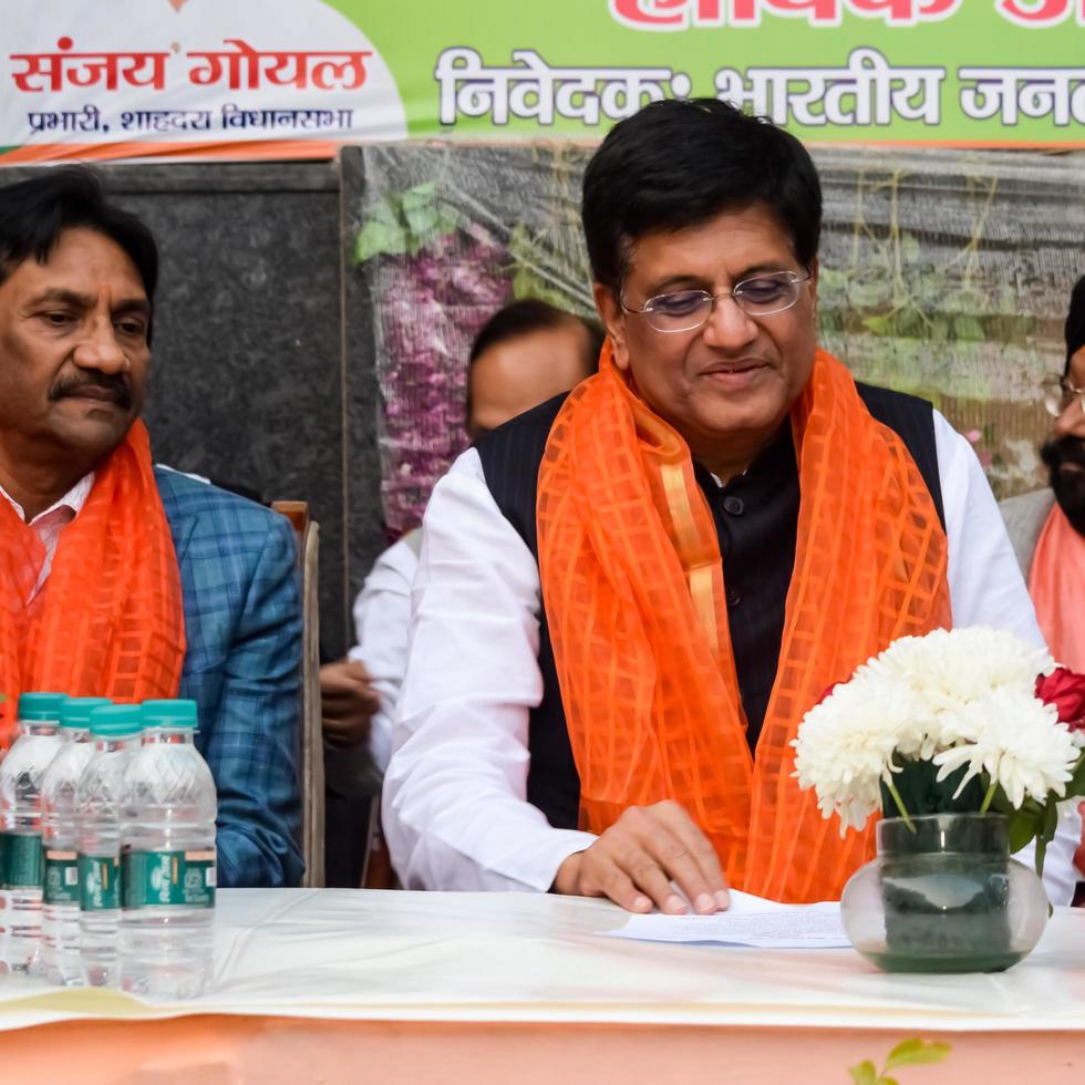 New Delhi, India - November 27 2022 - Piyush Goyal Cabinet Minister and core member of Bharatiya Janata Party BJP during a rally in support of BJP candidate ahead of MCD local body Elections 2022 photo
