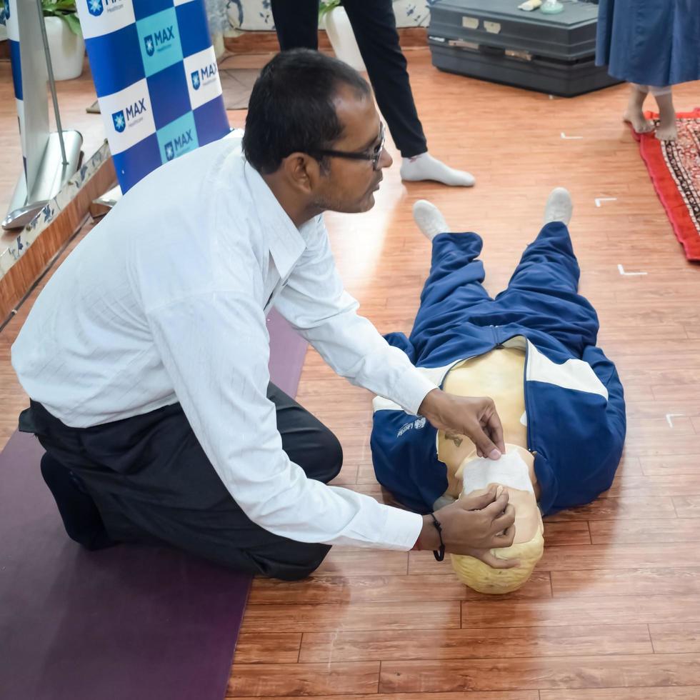 Delhi, India - November 19, 2022 - Human dummy lies on the floor during first Aid Training - Cardiopulmonary resuscitation. First aid course on CPR dummy, CPR First Aid Training Concept photo