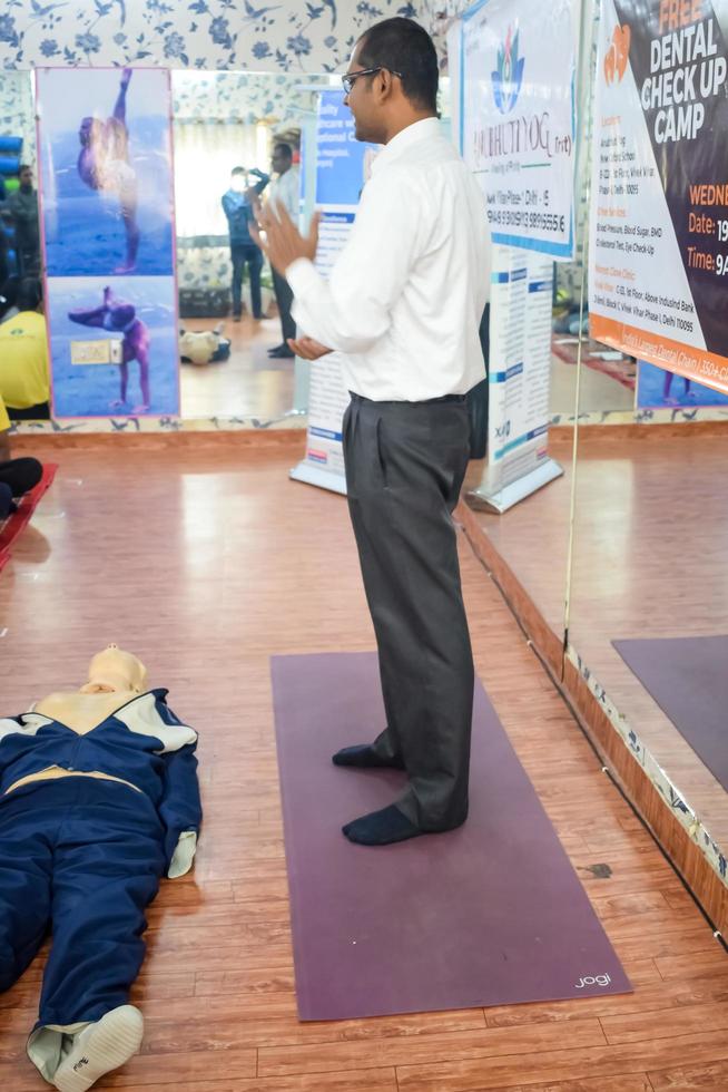 Delhi, India - November 19, 2022 - Human dummy lies on the floor during first Aid Training - Cardiopulmonary resuscitation. First aid course on CPR dummy, CPR First Aid Training Concept photo