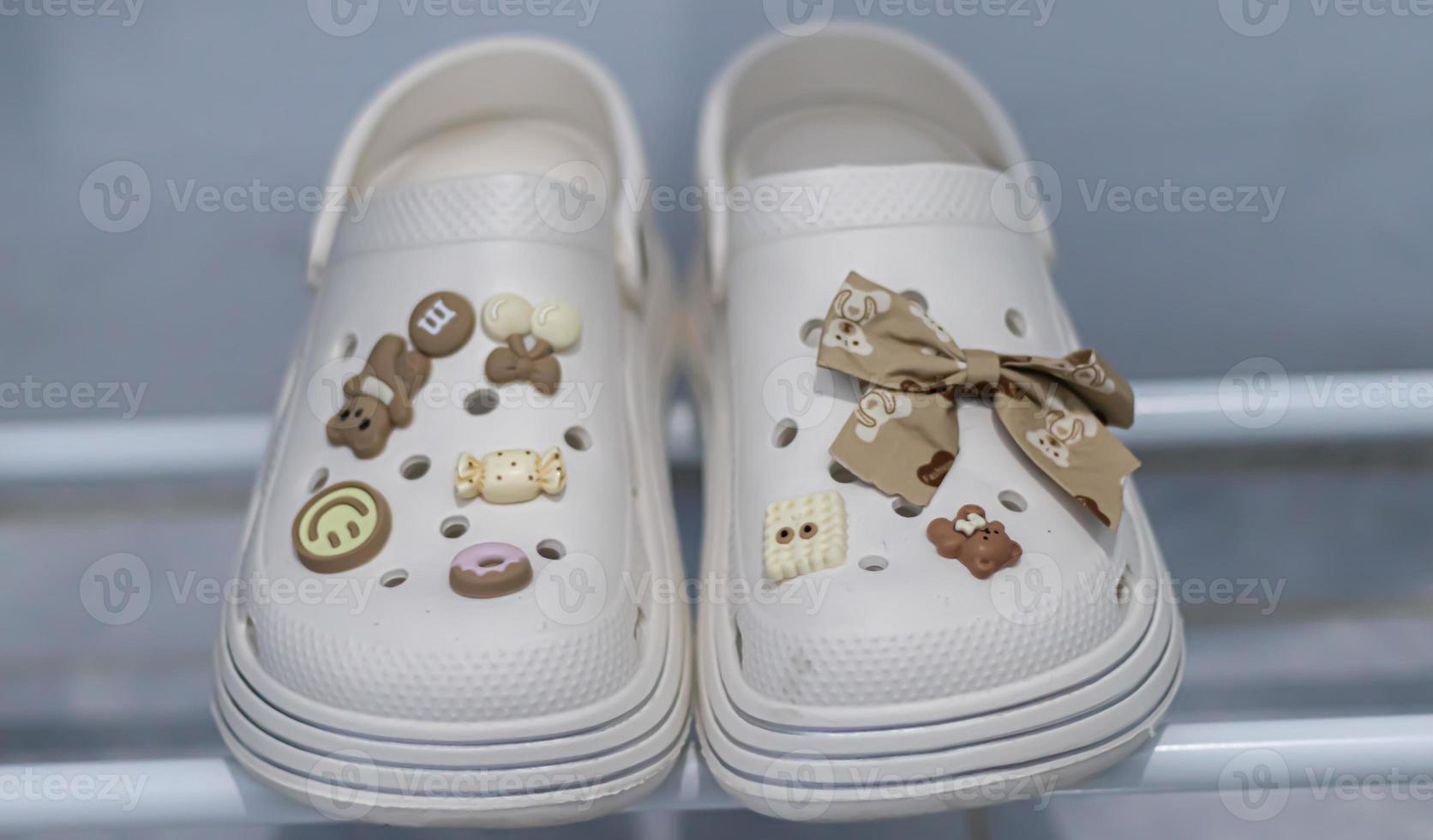 Rubber sandals on a shoe rack photo