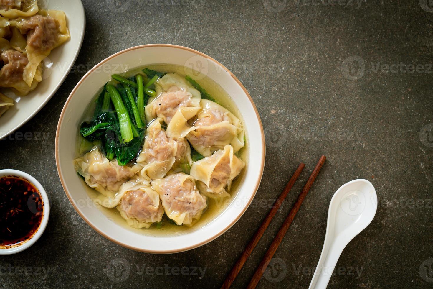 pork wonton soup or pork dumplings soup with vegetable photo