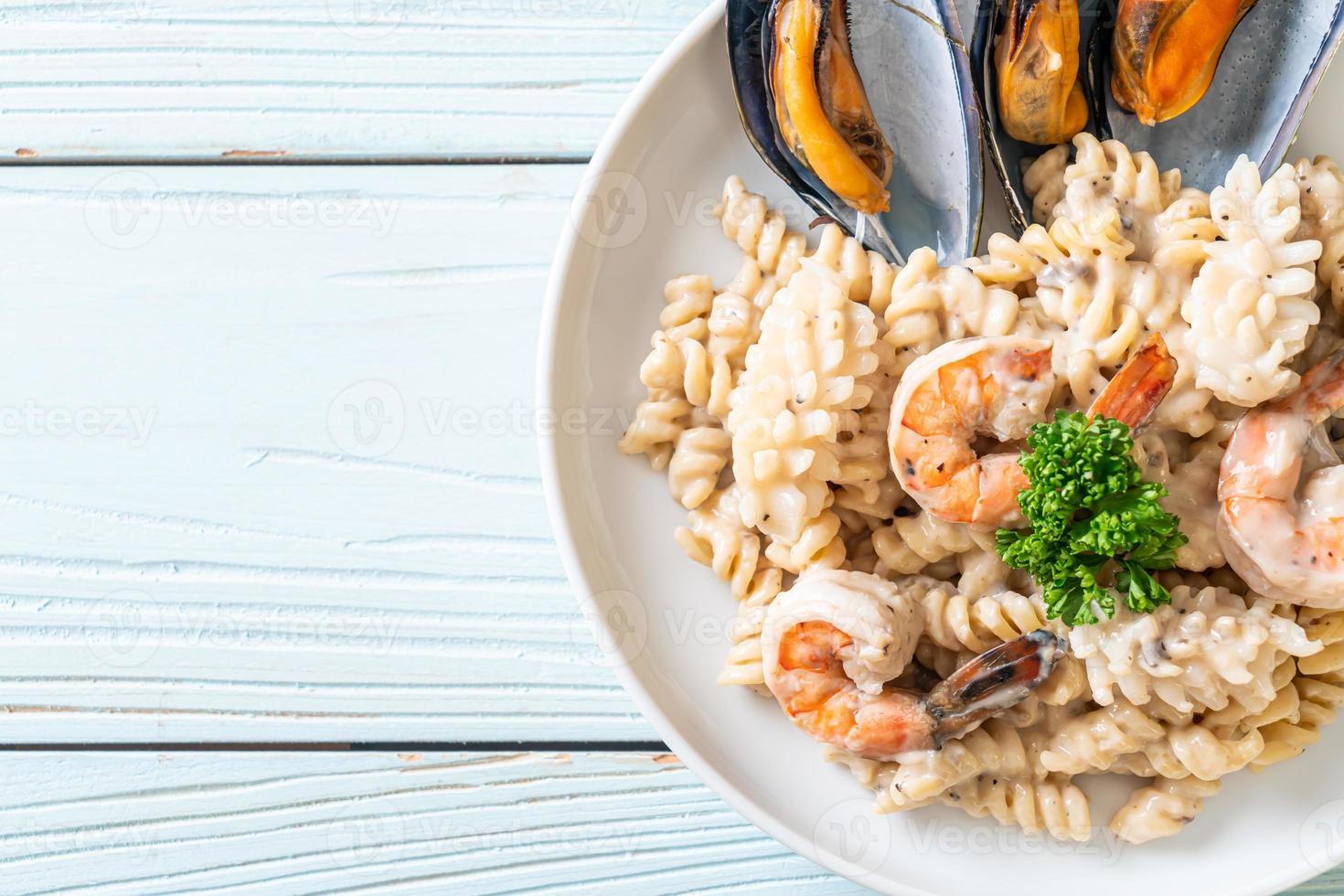 spiral pasta mushroom cream sauce with seafood 17107159 Stock Photo at
