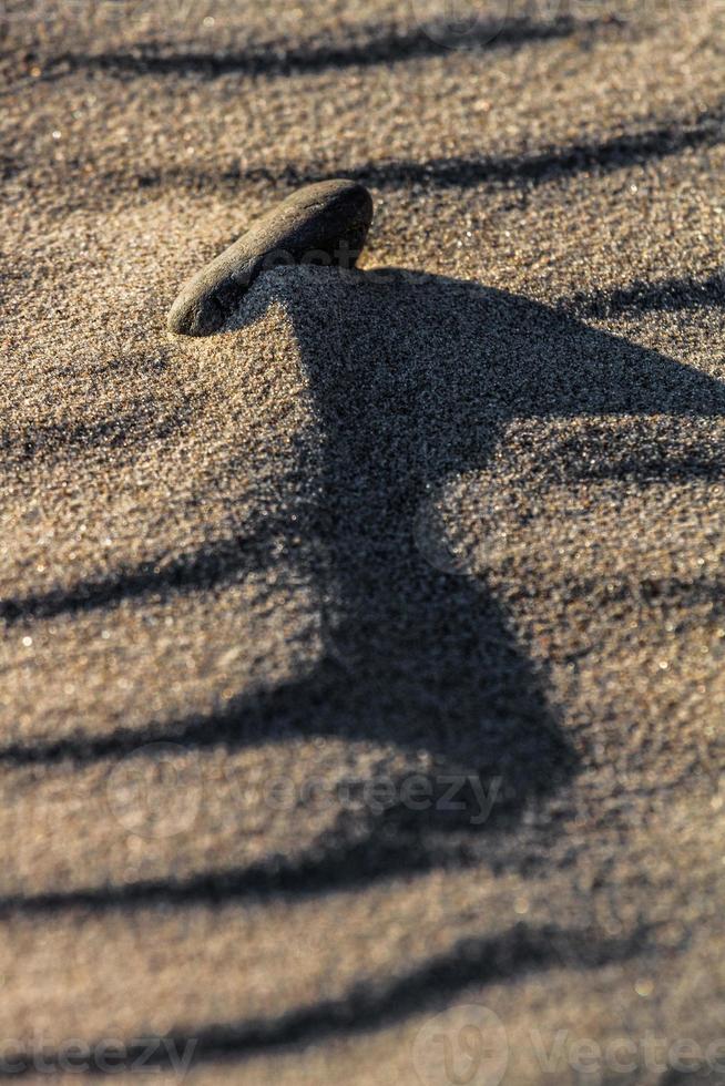 Patterns in the Sea Sand at Sunset photo