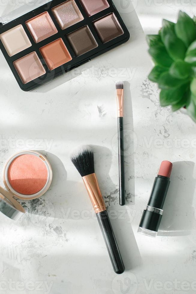 Set of decorative cosmetics - makeup brushes, accessory. Beauty, fashion, shopping concept photo