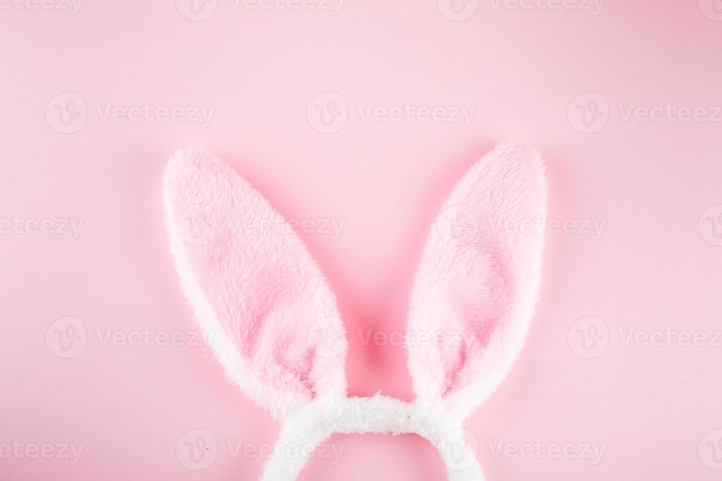 Bunny rabbits on pink background. Easter minimal concept. Top view, flat lay, copy space photo