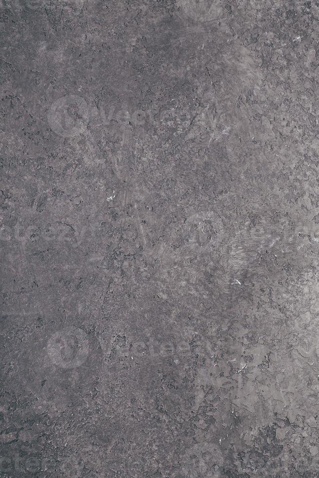 Texture of concrete vertical wall for background. Abstract brown chocolate background photo