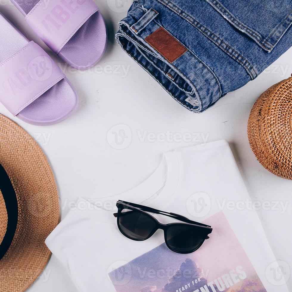 Casual women's clothing, acccessories. T-shirt, summer slippers, shorts, organic rattan bag, hat photo