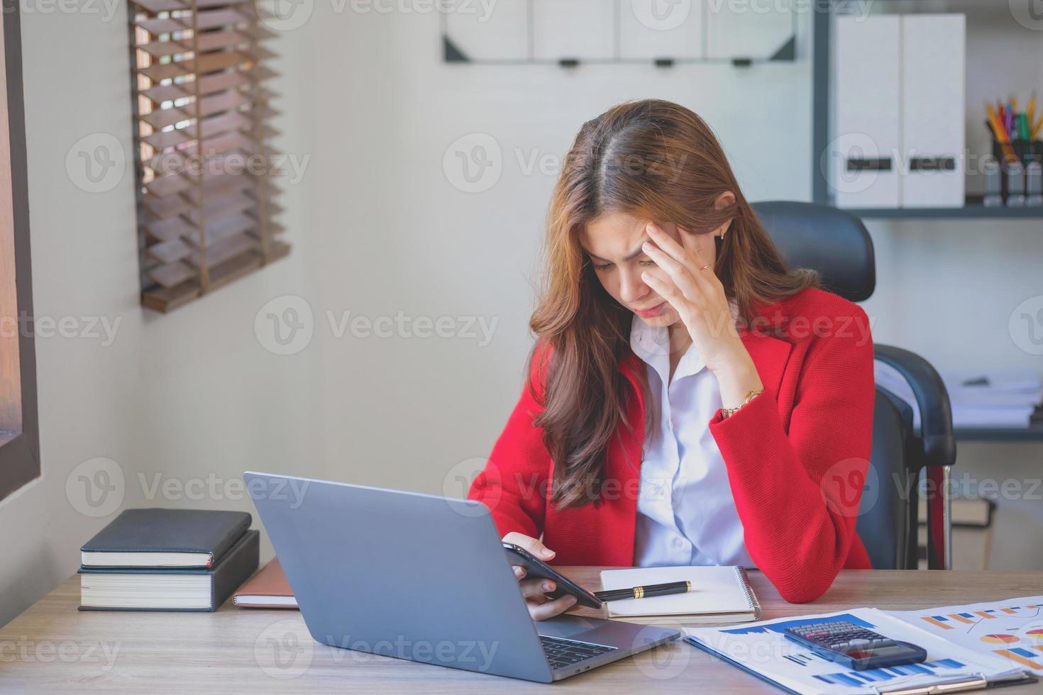 Concept Burnout Syndrome. Business Woman feels uncomfortable working. Which is caused by stress, accumulated from unsuccessful work And less resting body. Consult a specialist psychiatrist. photo