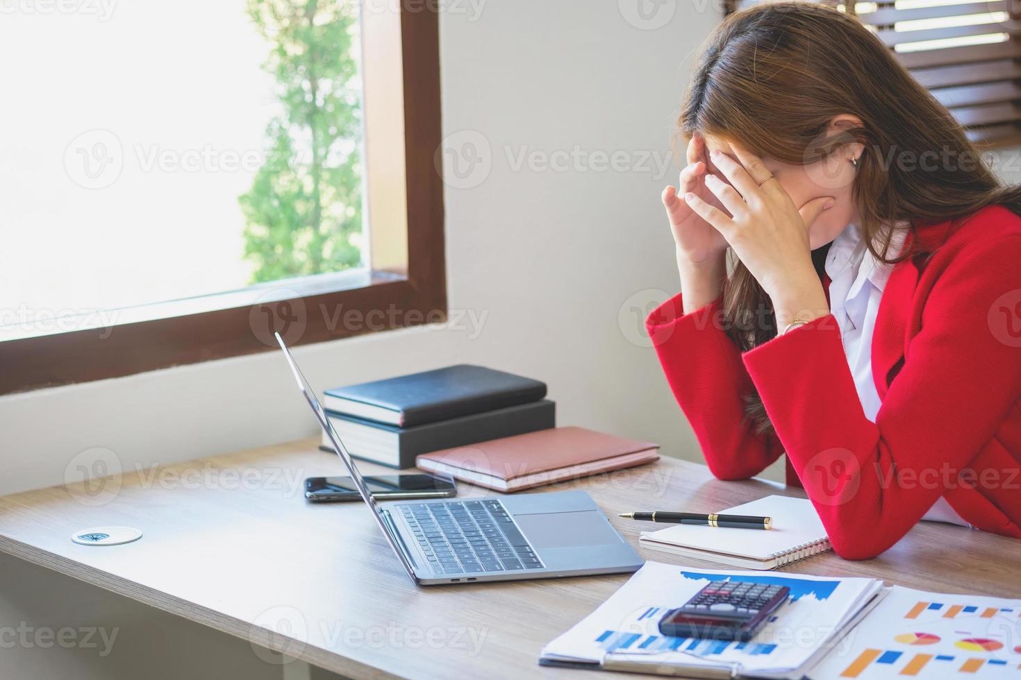 Concept Burnout Syndrome. Business Woman feels uncomfortable working. Which is caused by stress, accumulated from unsuccessful work And less resting body. Consult a specialist psychiatrist. photo