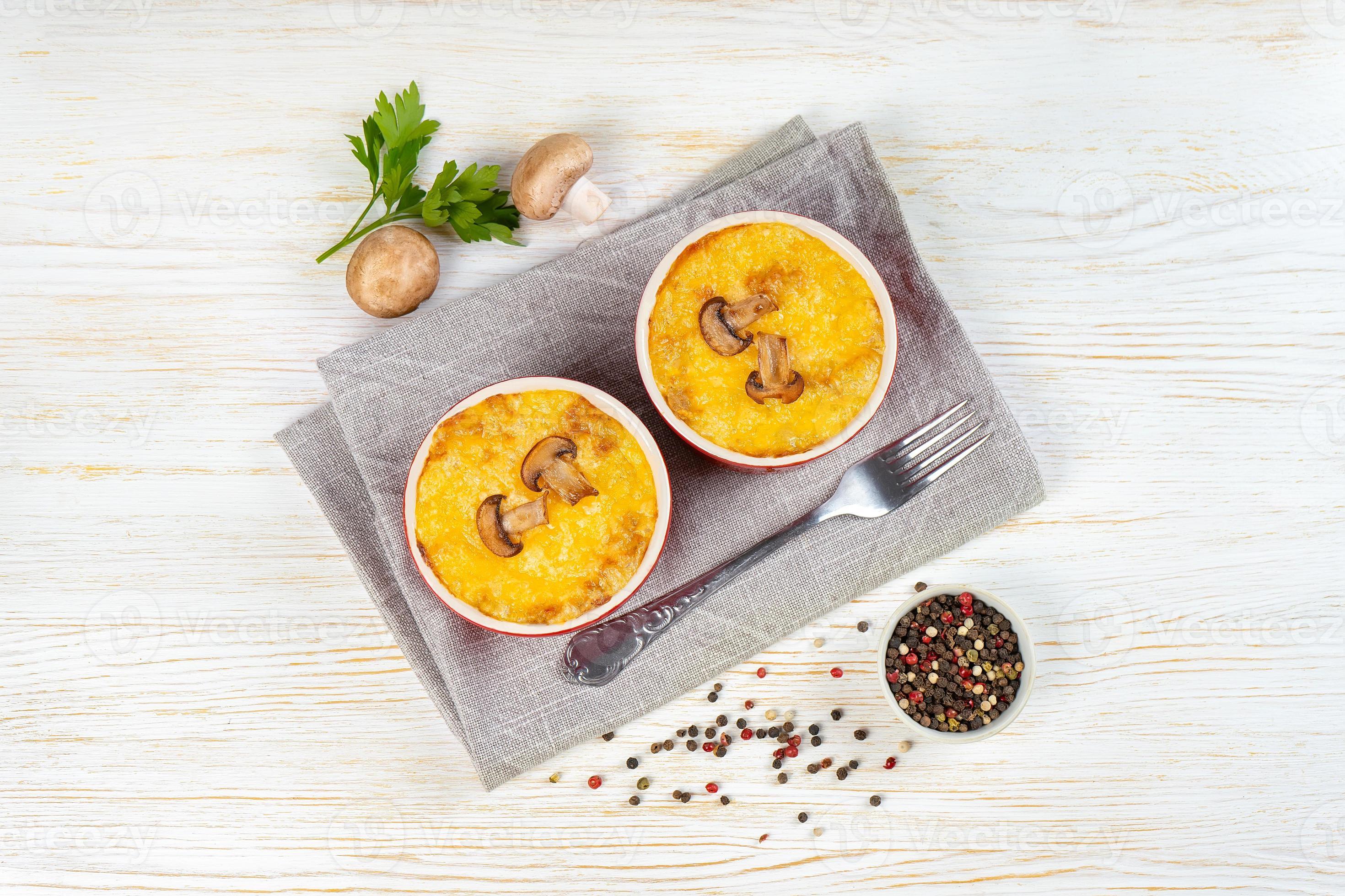 French Julienne casserole with chicken and mushroom in portion ramekin