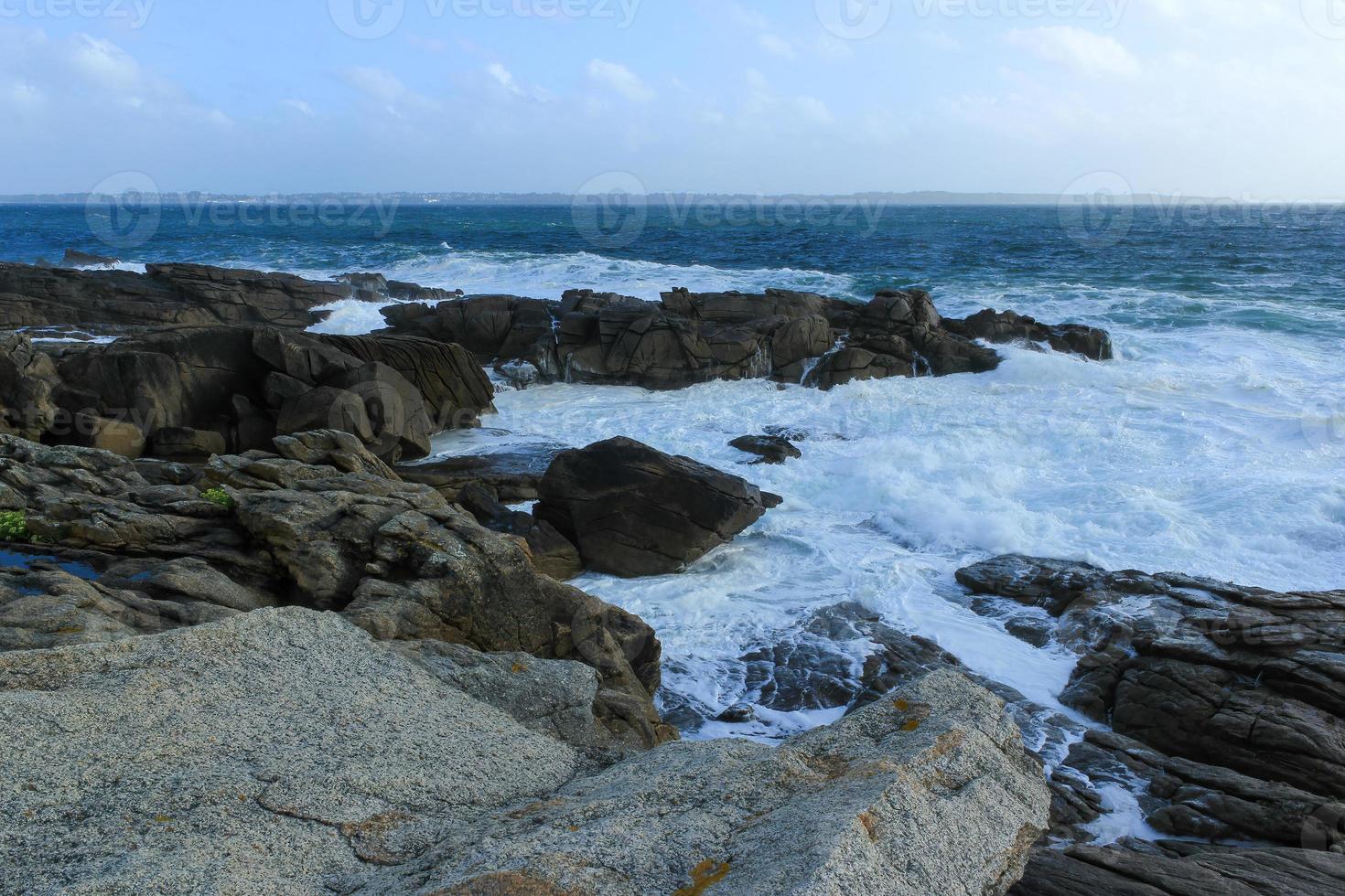 Sea waves crushing on the rocks 1 photo