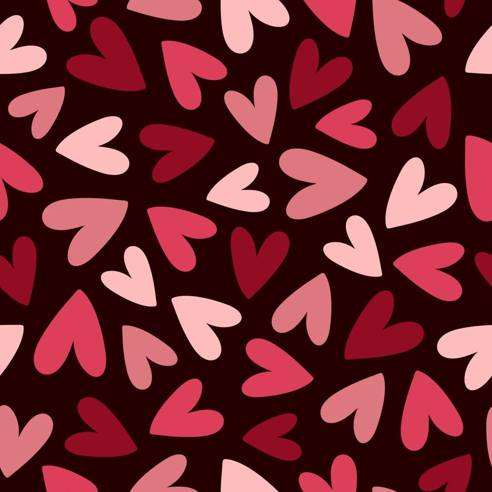 Abstract seamless pattern with red, pink and purple hearts on dark background. Hand drawn doodle style vector