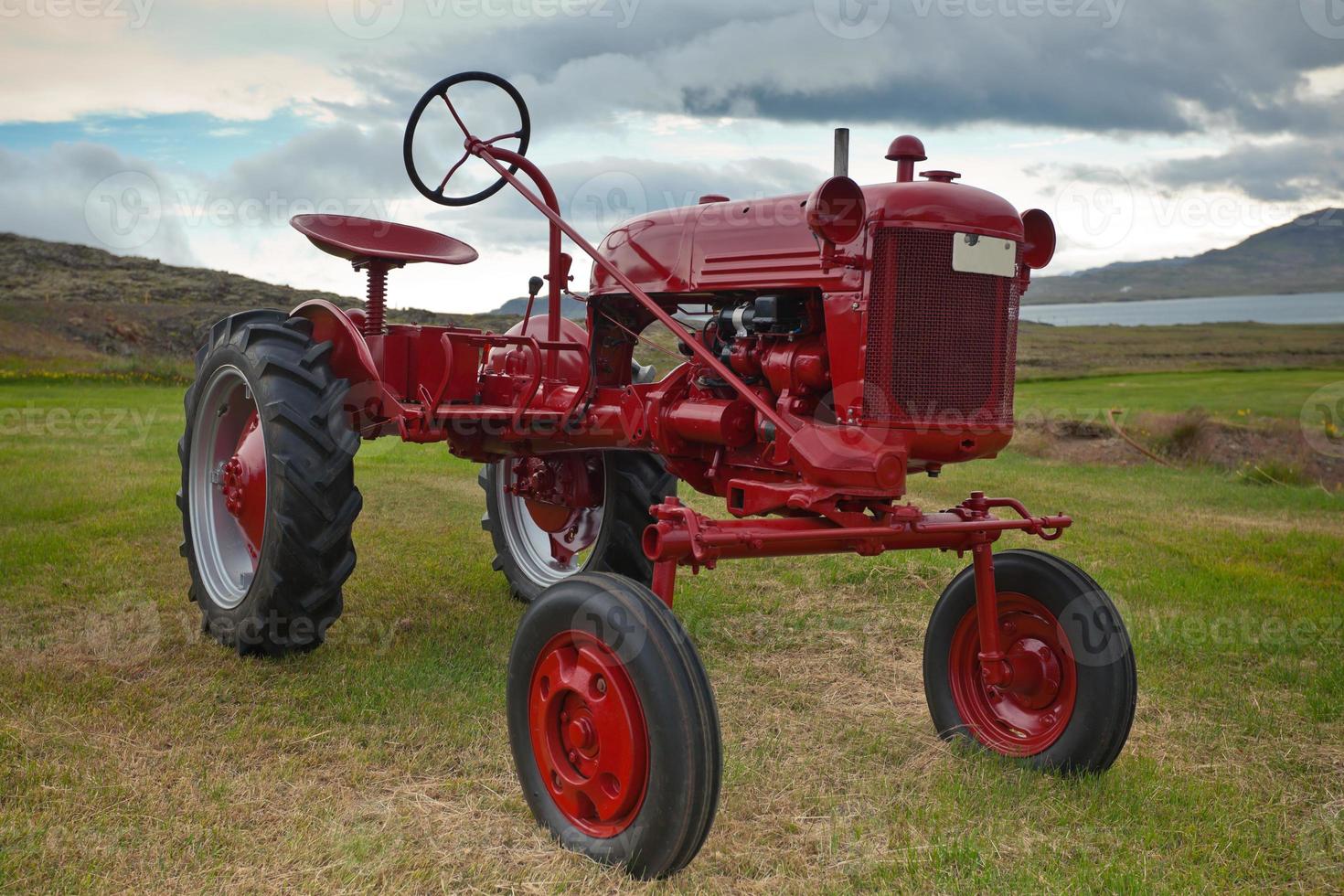 Retro Tractor on the Iceland field photo