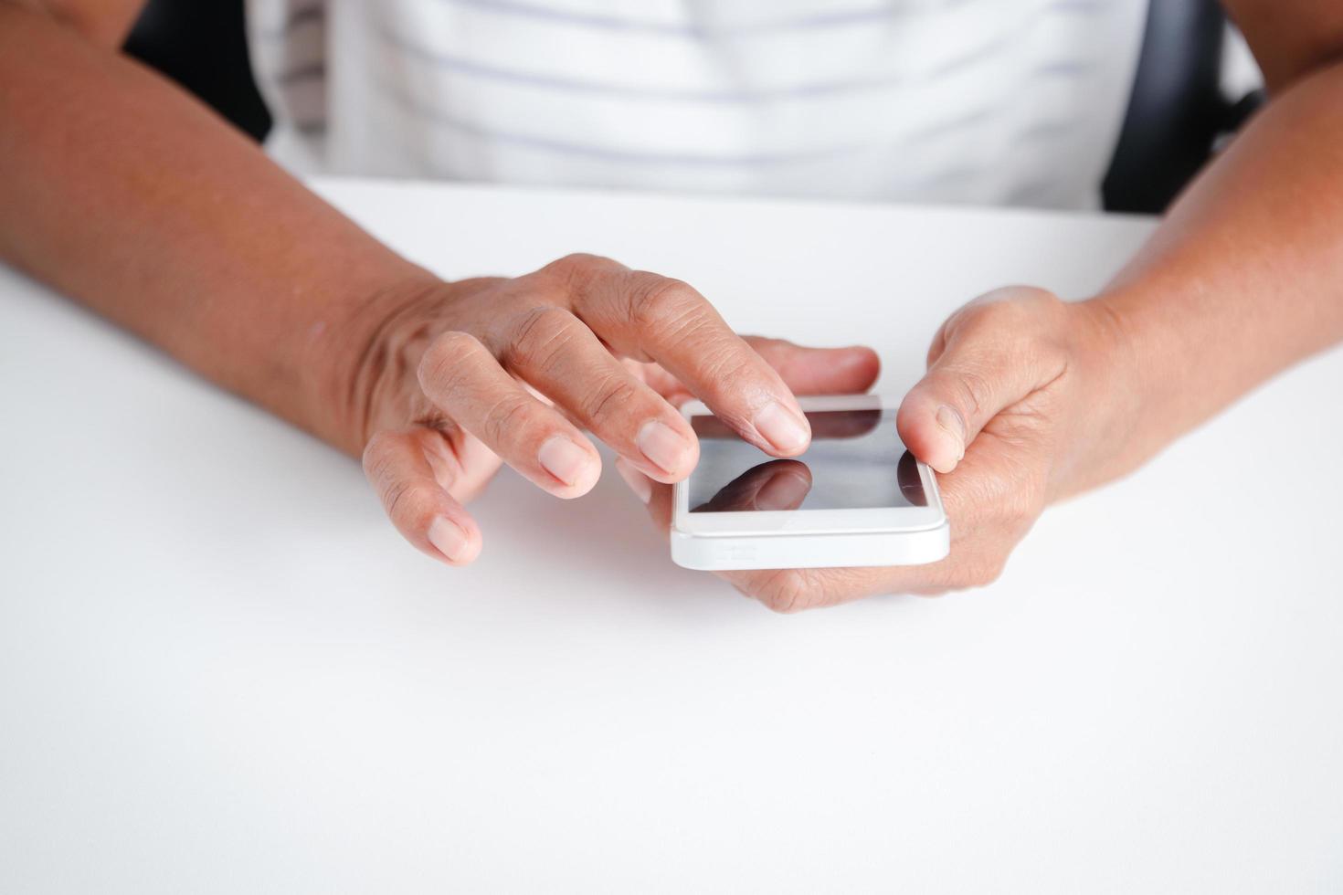 Asian elderly women learn online multimedia technology on their smart phones photo