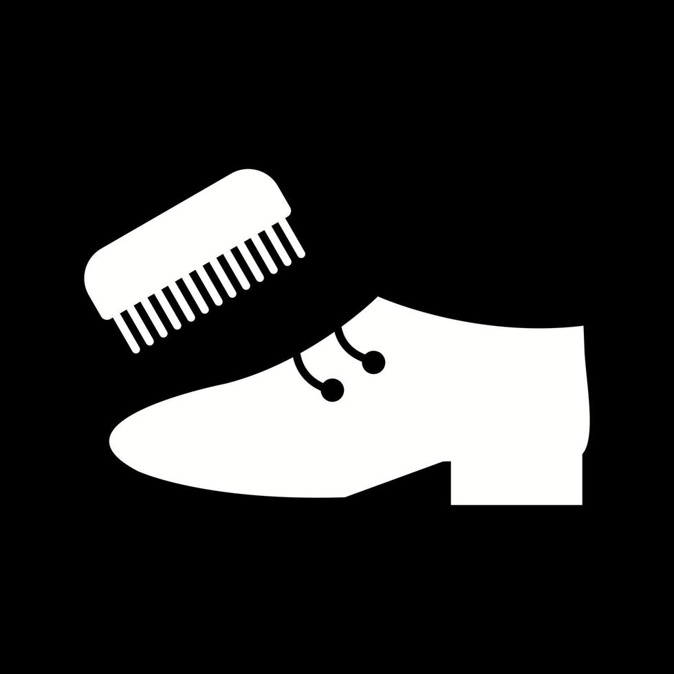 hermoso icono de vector de glifo de zapato y cepillo