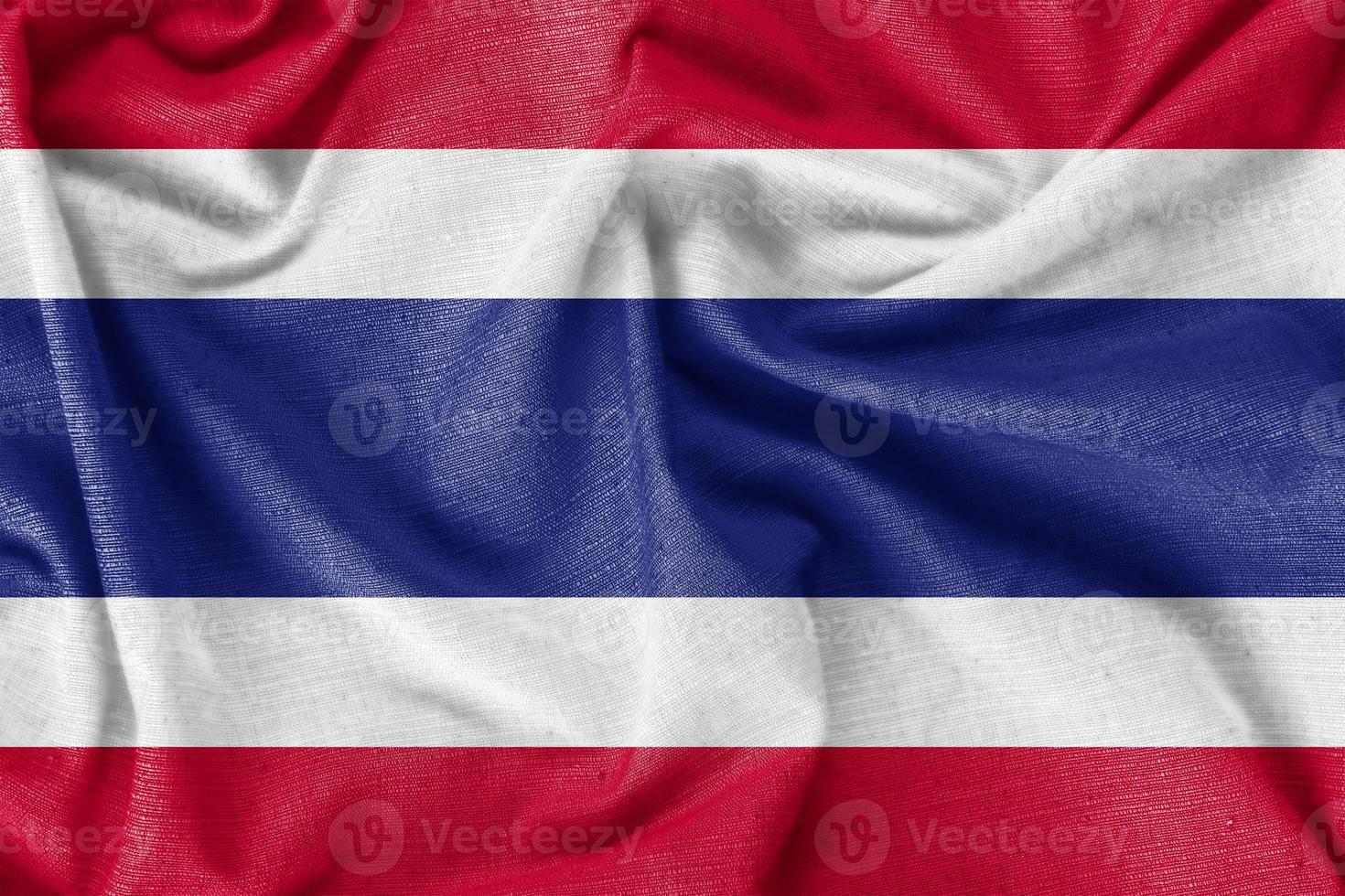 tela de seda realista del fondo de la bandera del país de tailandia foto