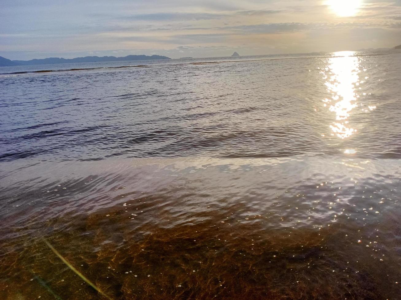 beautiful natural scenery of the beach at dusk photo