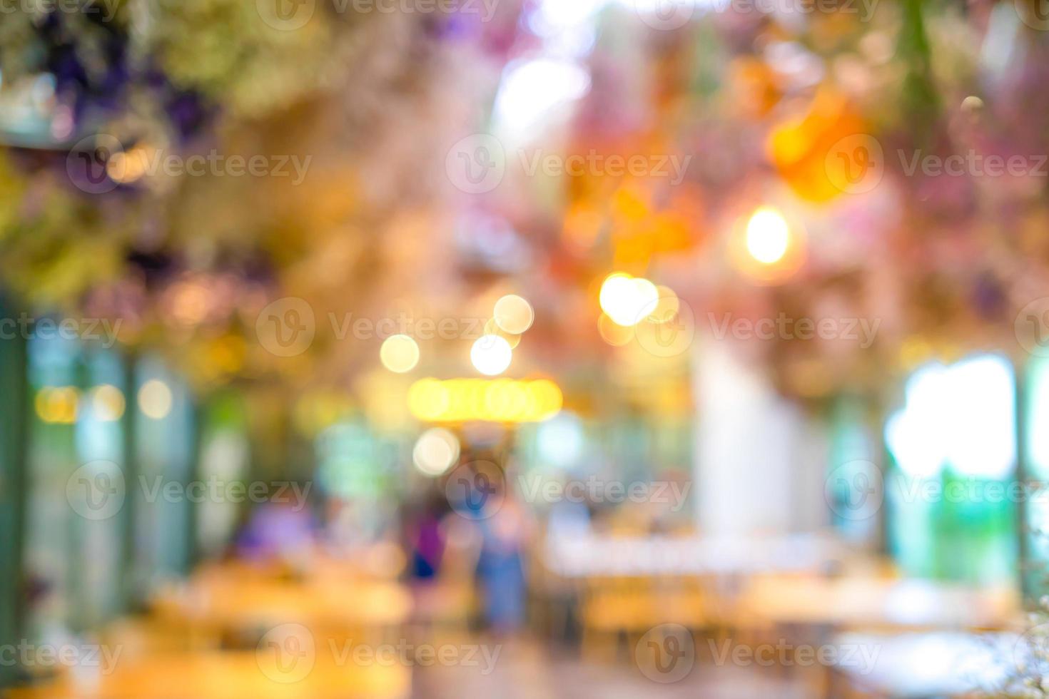 Blurry Bokeh Abstract DeFocus Green Yellow Brown colour in the restaurant that decorate by the tree for Cafe Bokeh Blurry Background. photo