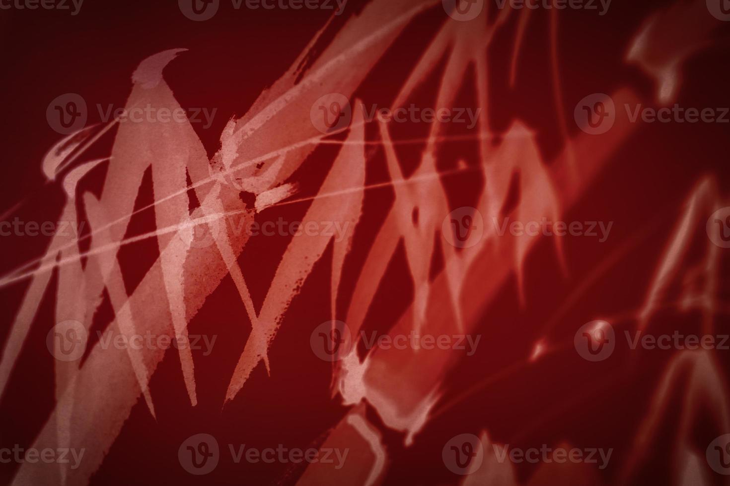 Abstract white bamboo paint brush on red background. photo