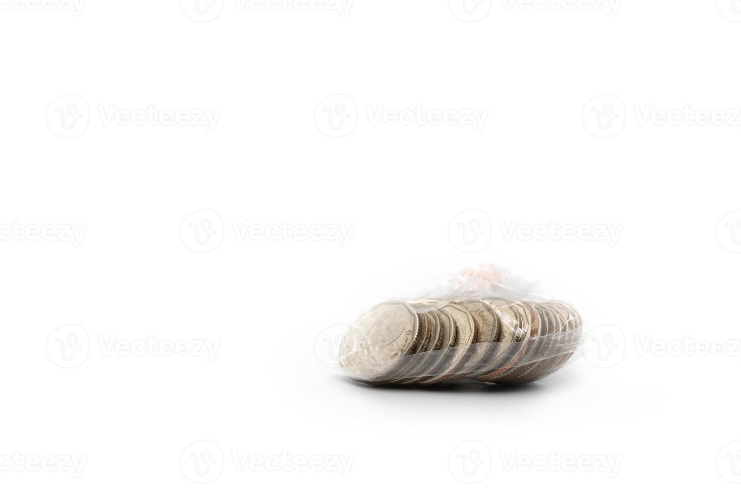 Thai Coin in Transparency plastic pack in studio light with white background. photo