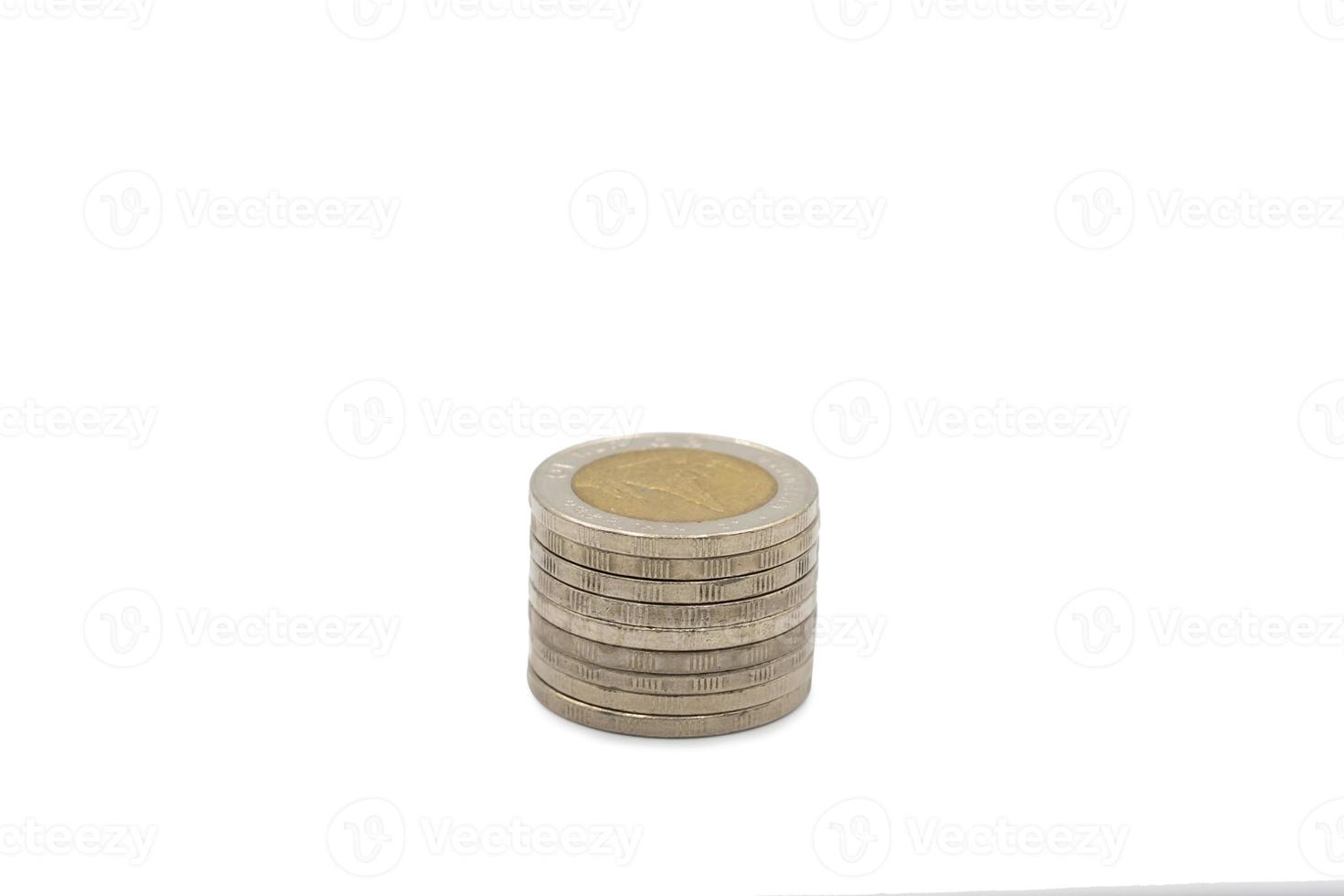 10 Baht coins The Thai silver and gold color inside the coin, with temple sign inside of it on white background. Clipping Path. photo