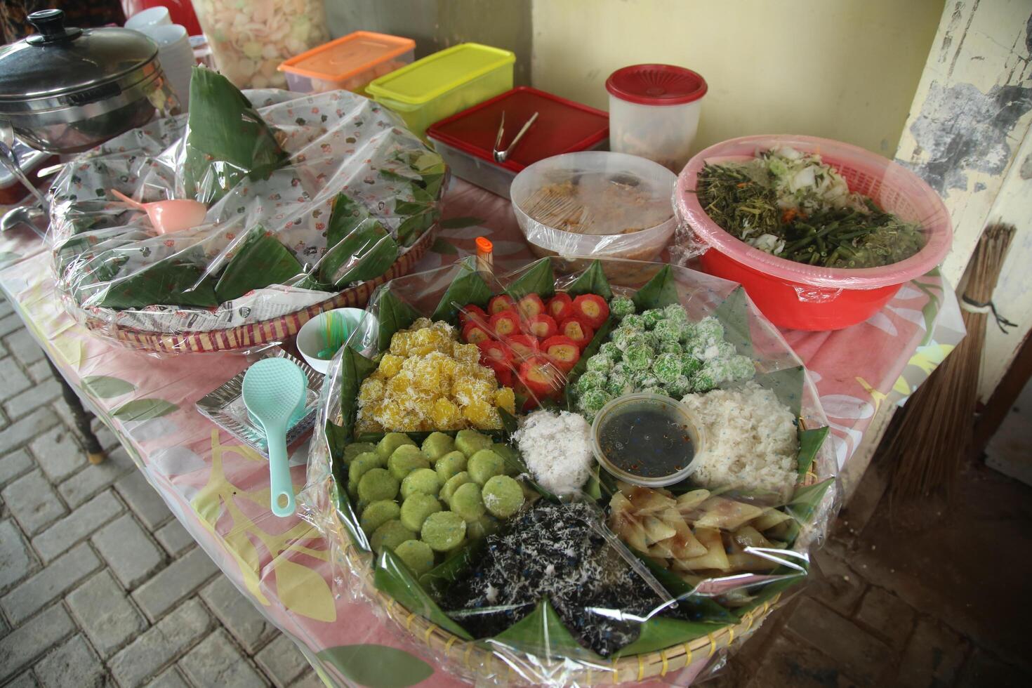 Java traditional food. The celebration of the Hijri New Year or the month of Sura in Javanese tradition serves tumpeng rice and its side dishes around the tumpeng rice. photo