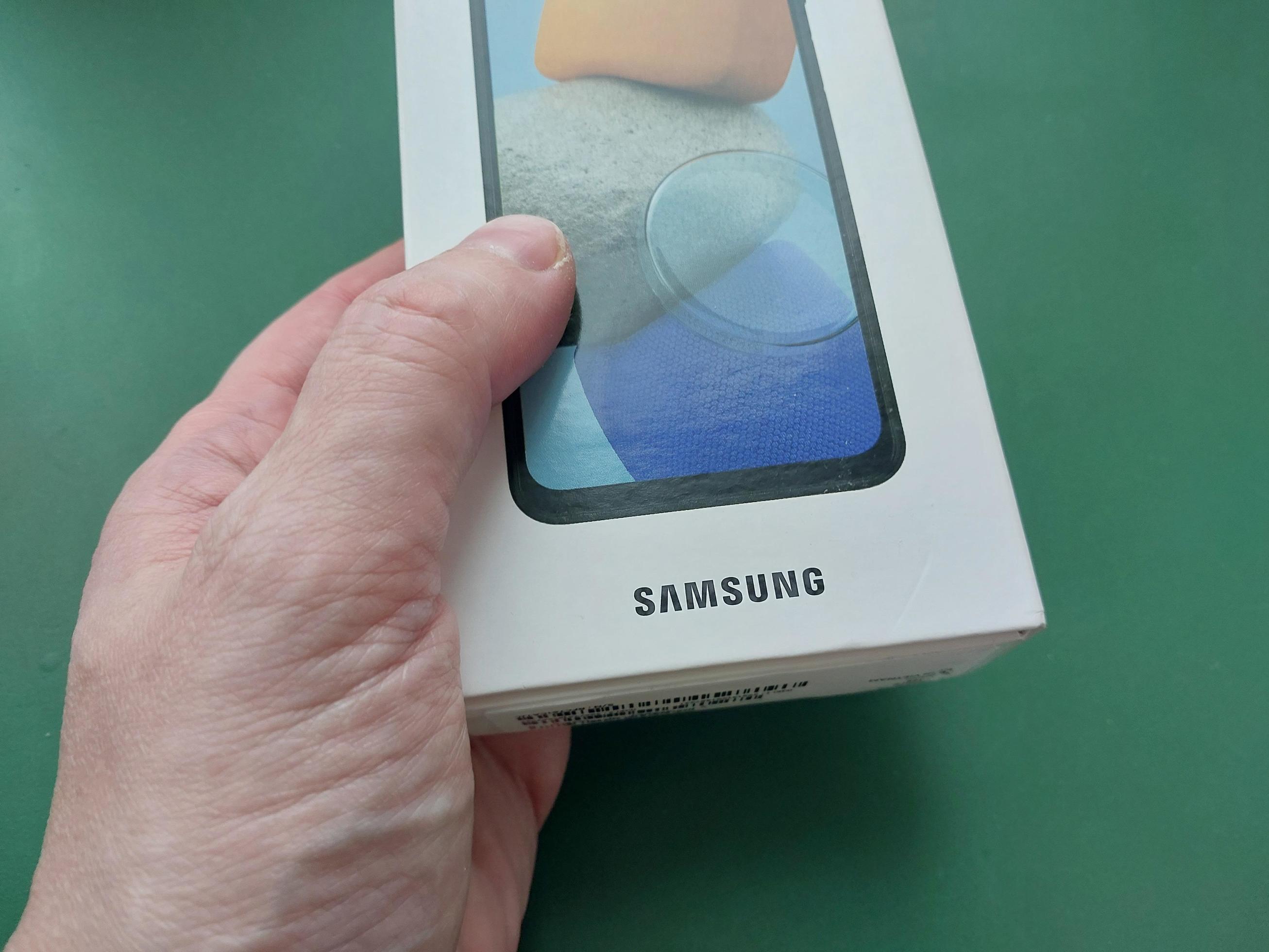 KYIV, UKRAINE - JANUARY 6, 2023 Packing box with company logo 17153060