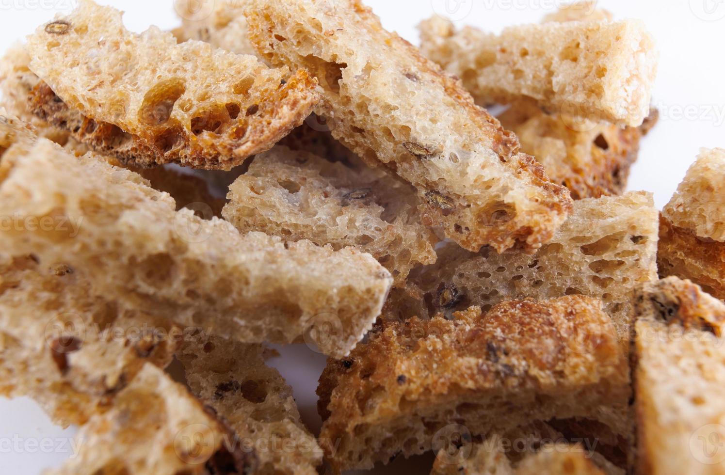 Crispy rusk on a white background. photo