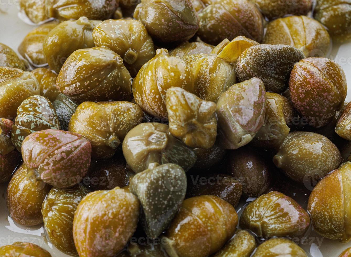 Background of beautiful pickled capers. Capers in brine. 17153315 Stock Photo at Vecteezy