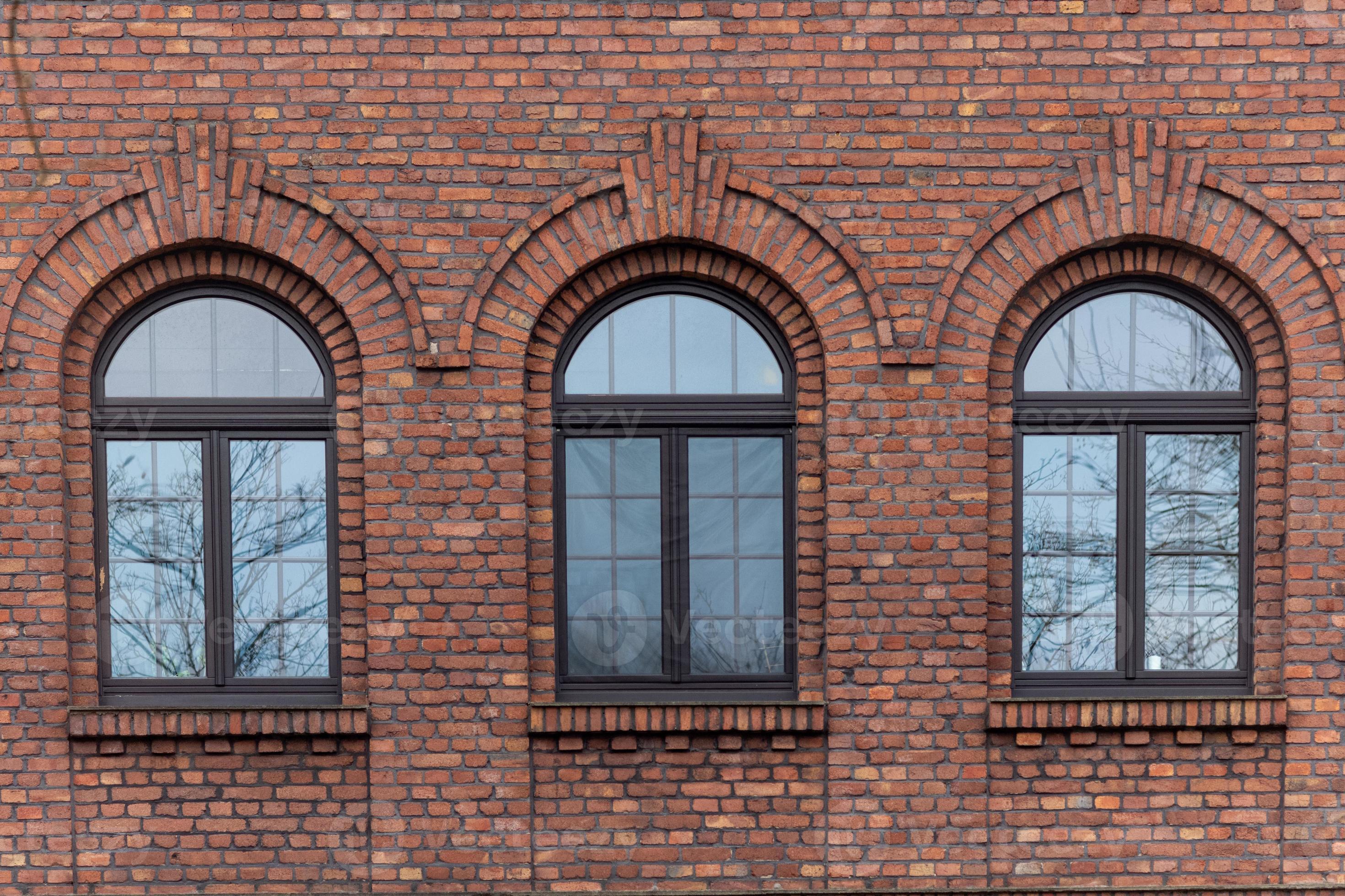 facade of a brick industrial building 17153428 Stock Photo at Vecteezy