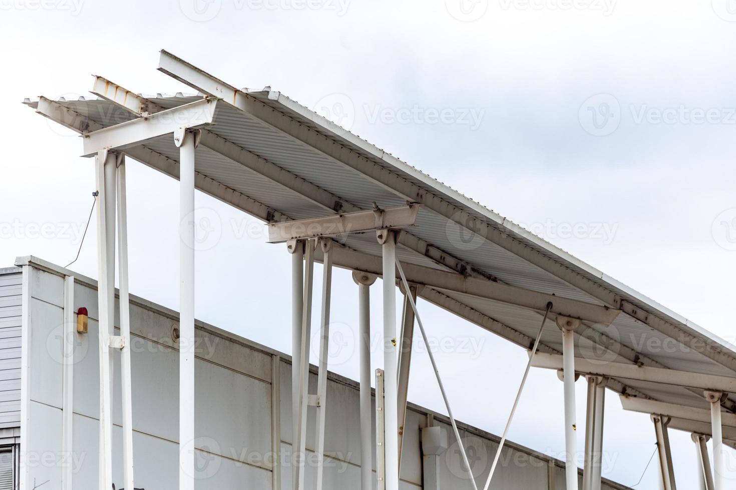 exterior staircase of a dilapidated old industrial building photo
