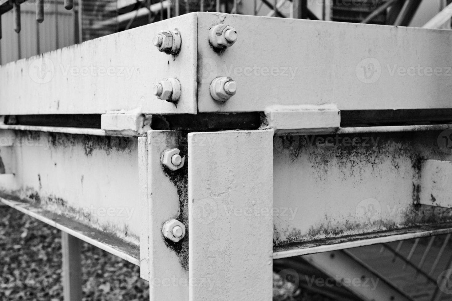riveted steel beams industrial buildings photo
