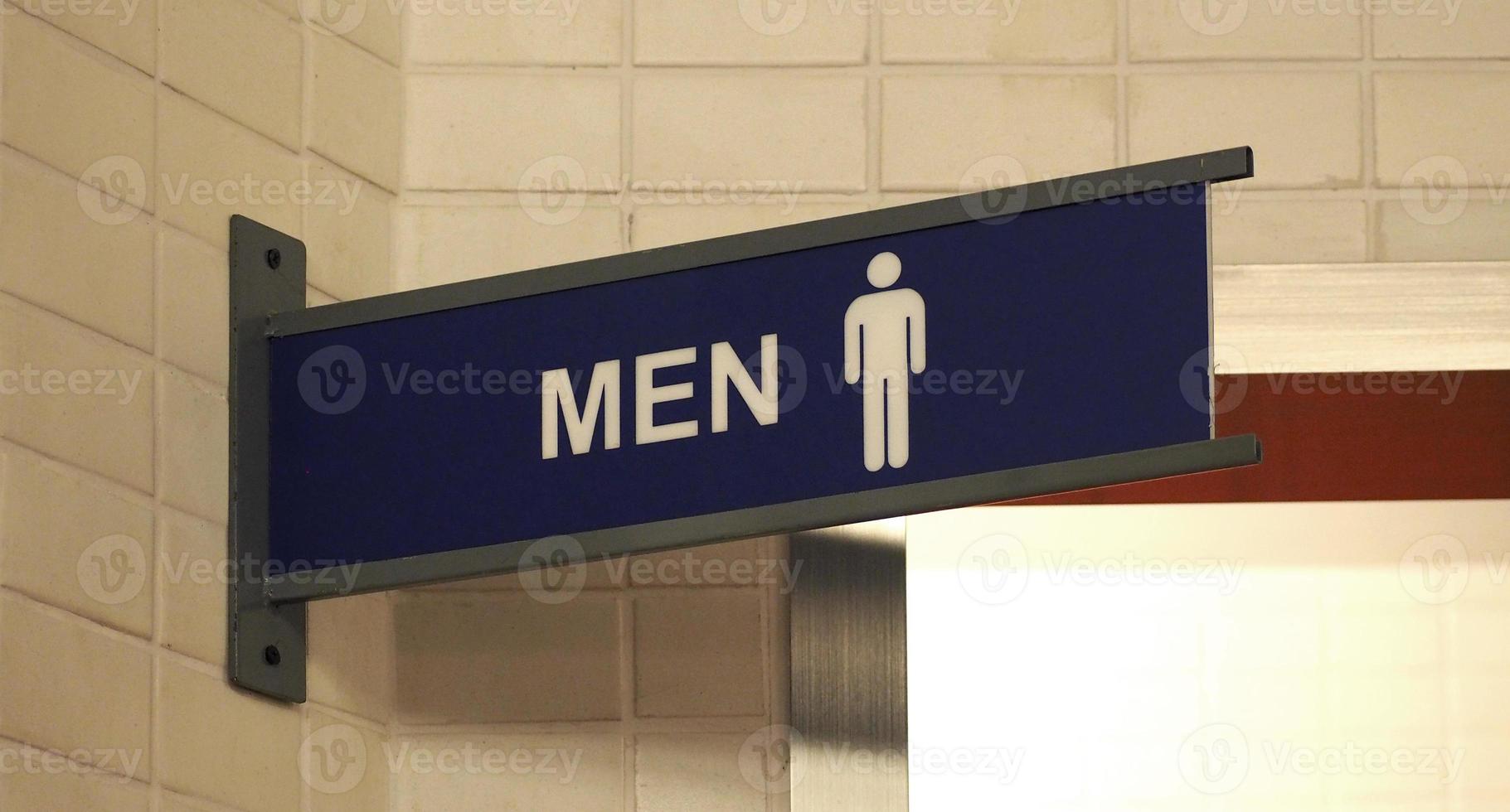 Toilet sign plastic tab with white and blue color . photo