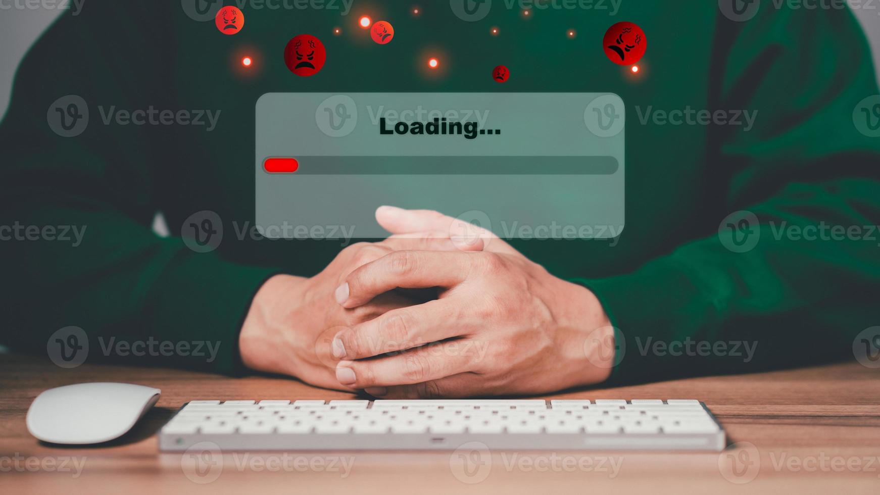 Man using a computer keyboard to download and waiting to loading digital business data form website, concept of waiting for load of loading bar. photo