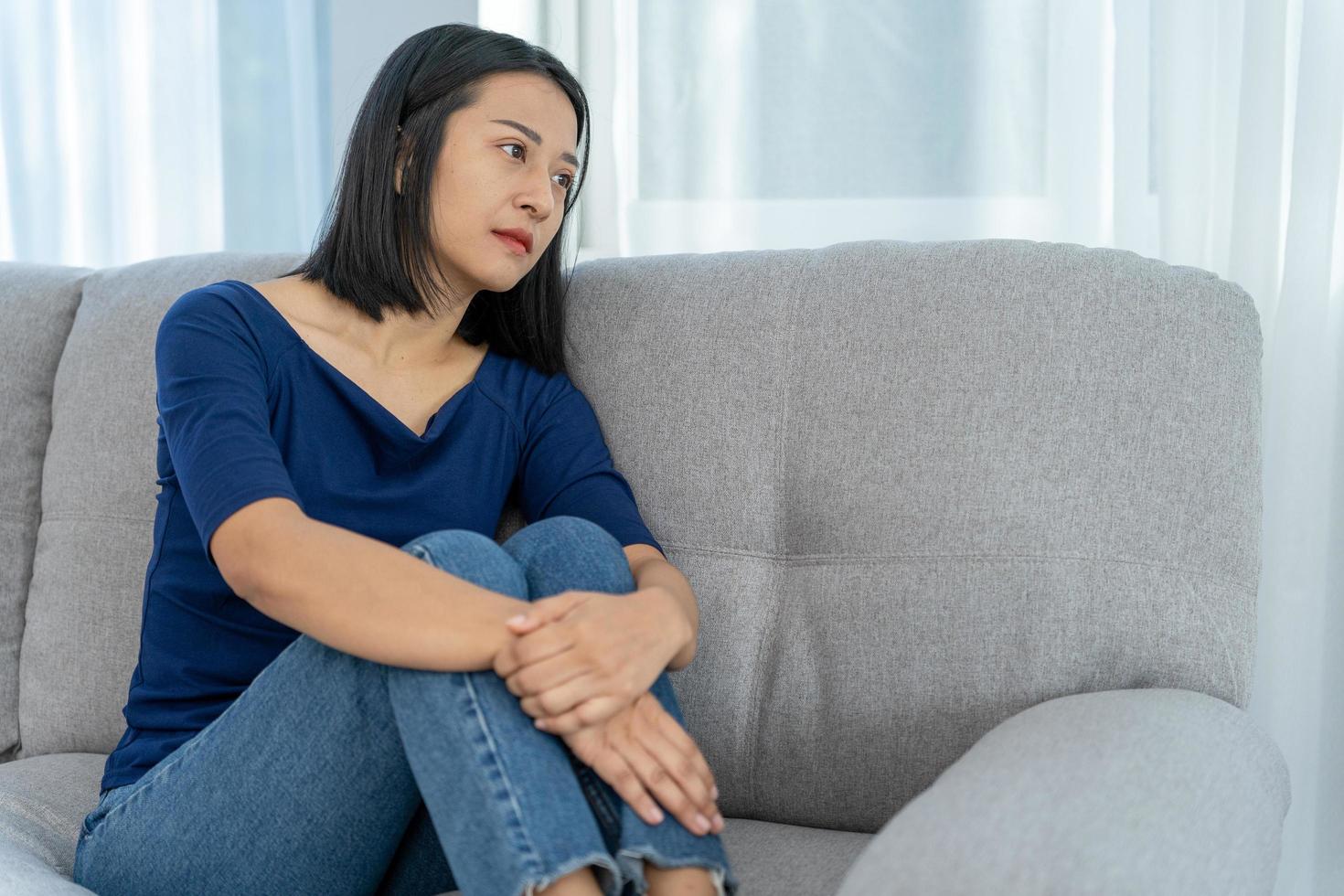 Unhappy asian woman girl disappointed, sad about problem in home alone, feel lonely, Stressed, suffering from bad relationship, break up, divorce, female confused, depression mental health, lone photo