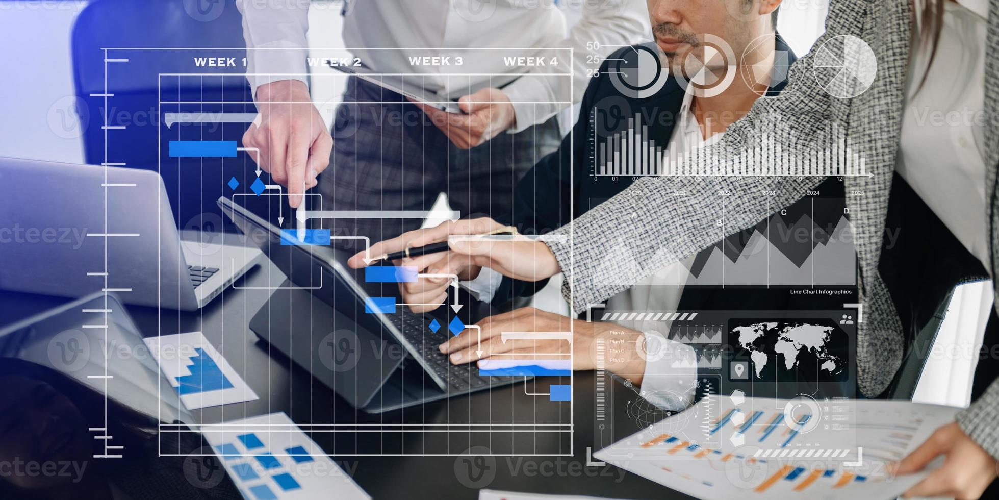 Businessman hand Project manager working and update tasks and Gantt chart scheduling virtual diagram.with smart phone, tablet and laptop photo