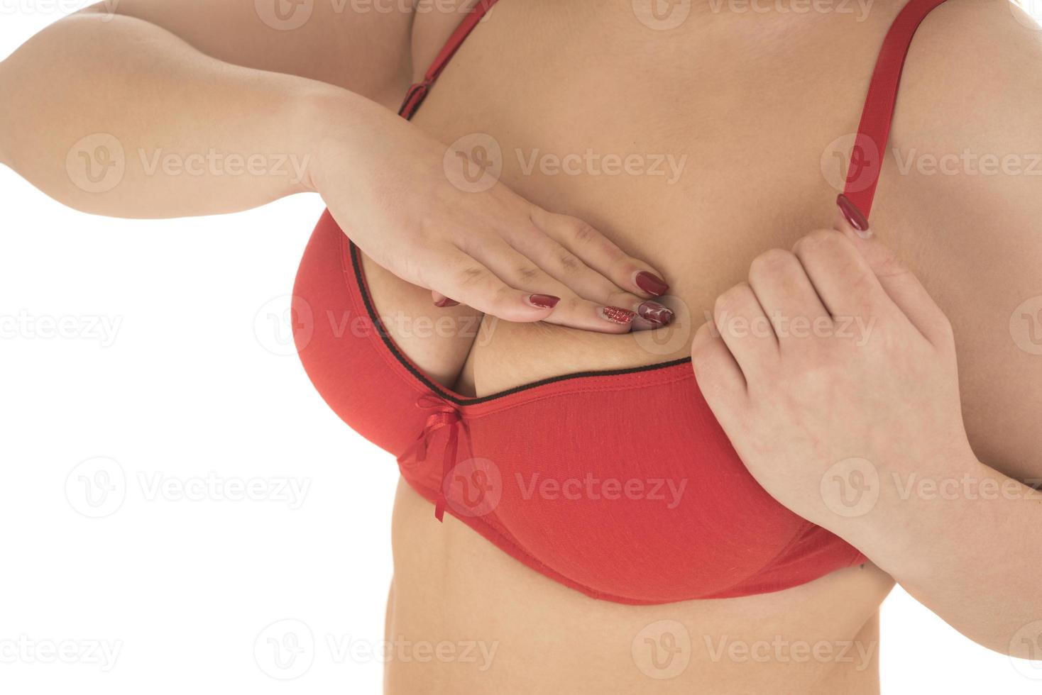 Woman Checking Her Breast, Breast Self-Exam, How do I check breast concept, Breast Cancer Awareness photo