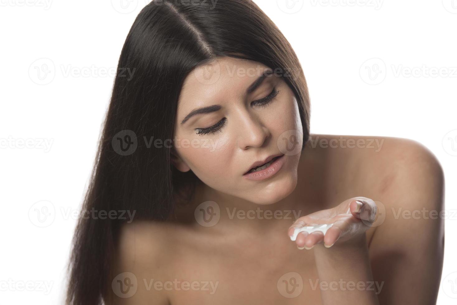 Body Care. Woman Applying Moisturizing Lotion Or Cream on her body photo