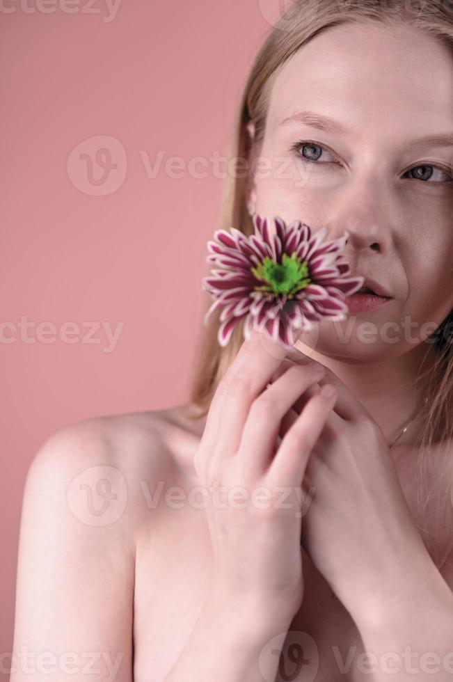 beautiful attractive stylish woman holding flower photo