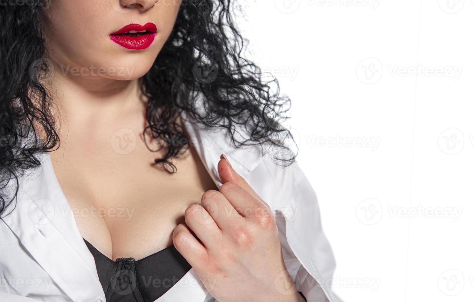 beautiful female with curly hair wearing black bra and white male